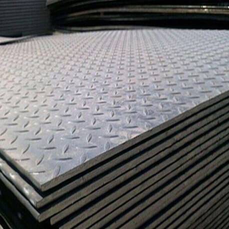 Carbon steel chequered tread plates stacked for export