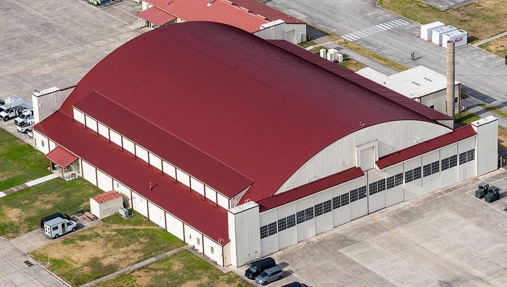 Airport hangar clad with color-coated roofing sheet