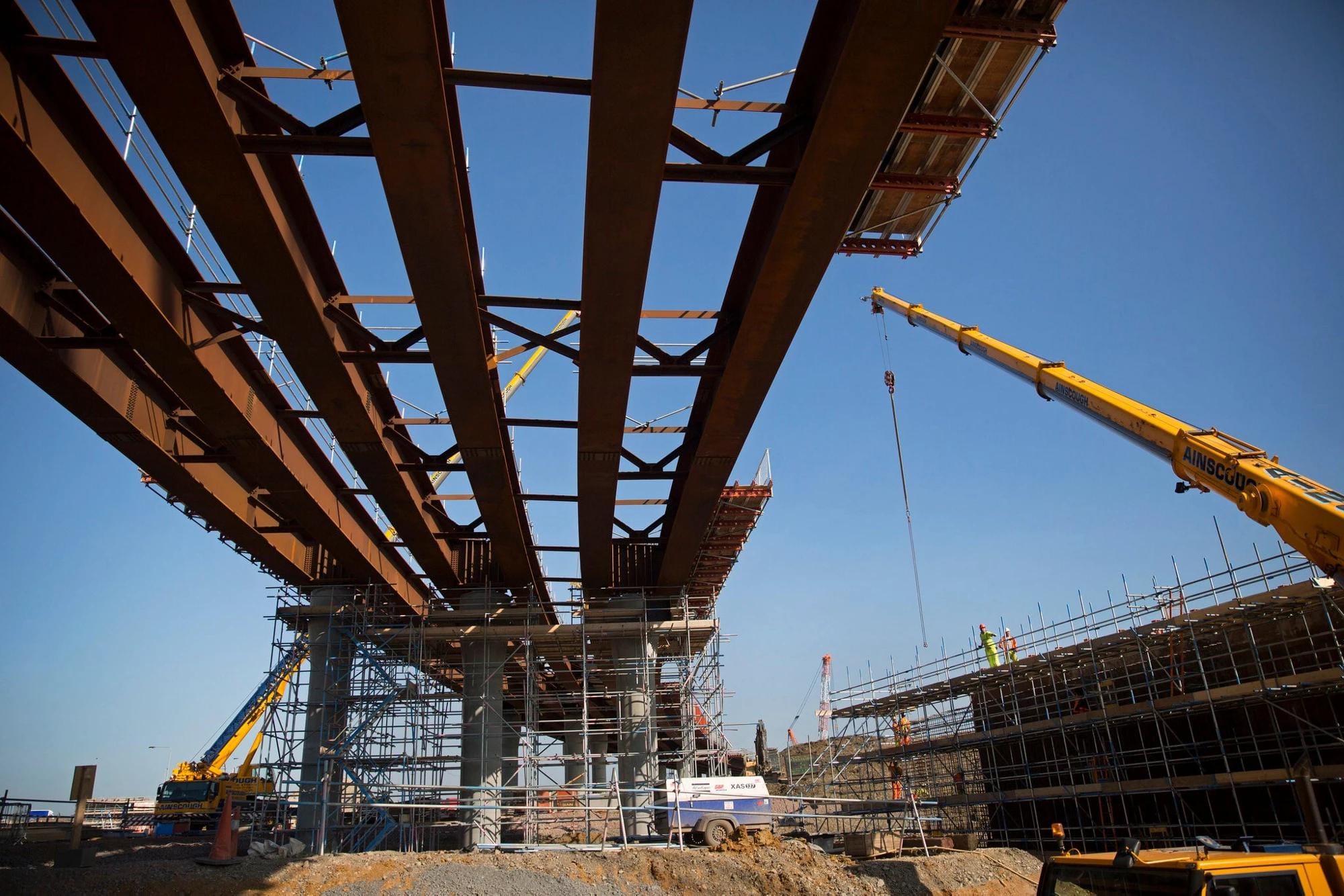 Bridge structure using H beam girders