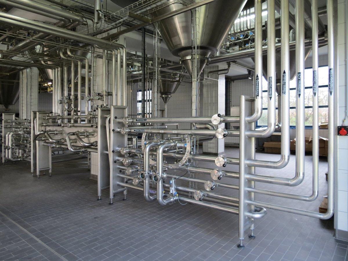 Food processing lines using stainless steel tube